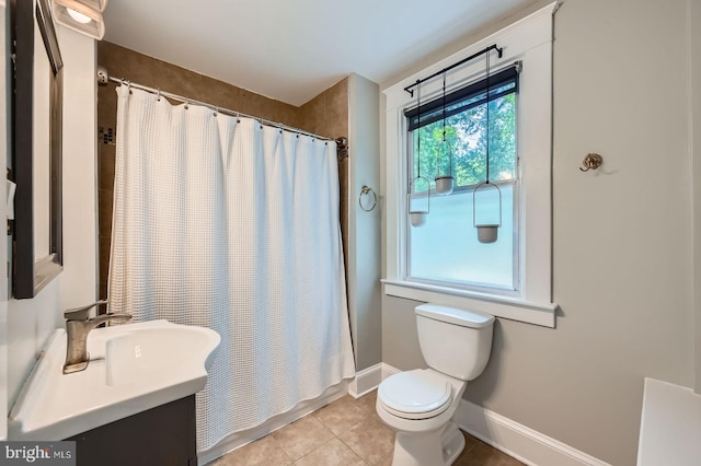 818 Glen Allen Dr, Baltimore, MD 21229 - full bathroom featuring toilet, vanity, tile patterned flooring, baseboards, and shower / bath combination with curtain