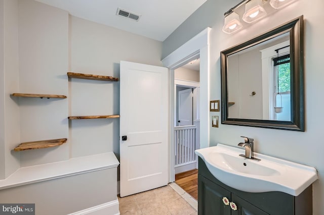 818 Glen Allen Dr, Baltimore, MD 21229 - bathroom featuring vanity and tile patterned floors