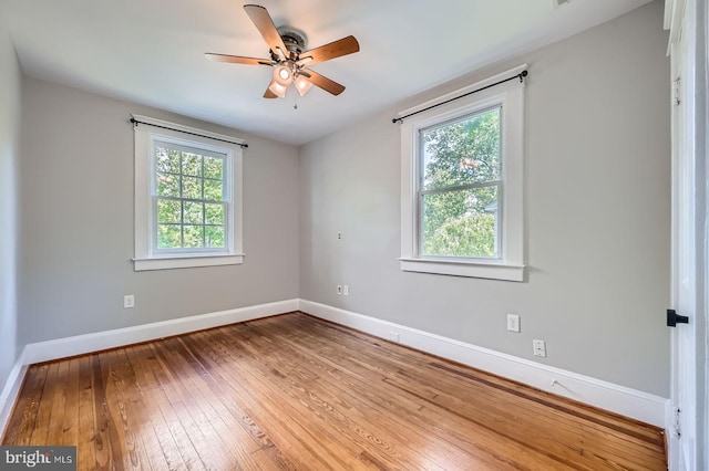 818 Glen Allen Dr, Baltimore, MD 21229 - unfurnished room with baseboards, wood-type flooring, and a ceiling fan