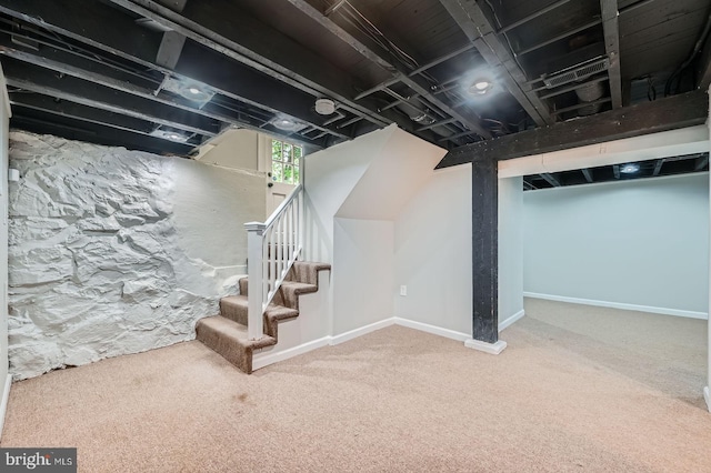 818 Glen Allen Dr, Baltimore, MD 21229 - basement featuring carpet floors, stairway, and baseboards
