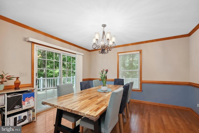 3 Franklin St, Stafford, VA 22556 - dining area with a chandelier, ornamental molding, light wood-style flooring, and baseboards