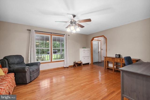 3 Franklin St, Stafford, VA 22556 - office space with light wood-style flooring, ceiling fan, baseboards, and arched walkways