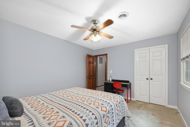 3 Franklin St, Stafford, VA 22556 - bedroom with light colored carpet, a closet, baseboards, and a ceiling fan