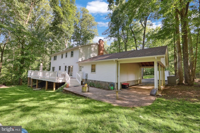3 Franklin St, Stafford, VA 22556 - rear view of house with a yard, a chimney, and a deck