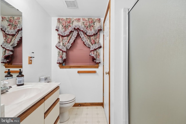 3 Franklin St, Stafford, VA 22556 - full bath featuring vanity, tile patterned floors, toilet, a shower with door, and baseboards