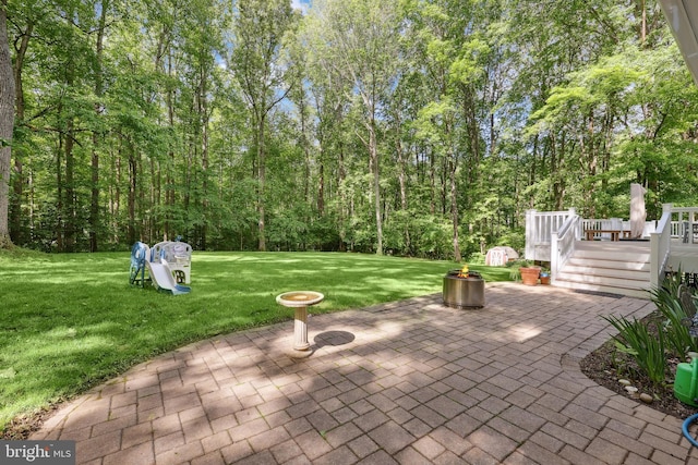 3 Franklin St, Stafford, VA 22556 - view of patio with an outdoor fire pit and a deck