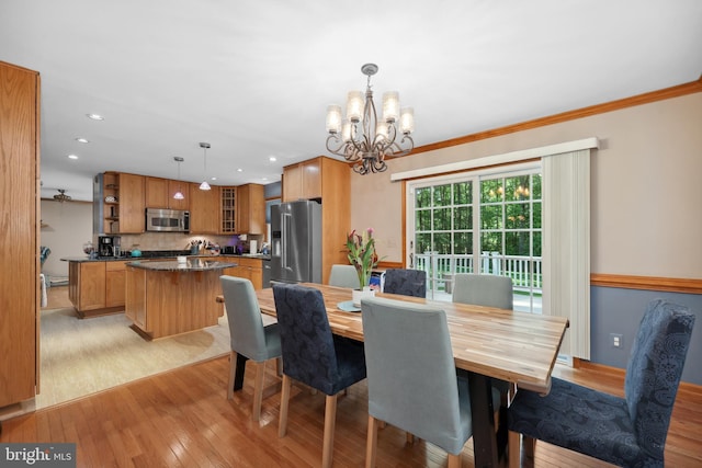 3 Franklin St, Stafford, VA 22556 - dining area featuring a chandelier, light wood-type flooring, recessed lighting, and crown molding
