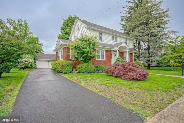 27 N Warren St, Woodbury, NJ 08096 - traditional-style home with brick siding, a front yard, a garage, and a shingled roof