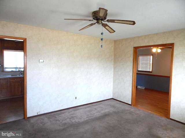12 Gerard Rd, Hamilton, NJ 08620 - empty room with a ceiling fan and carpet