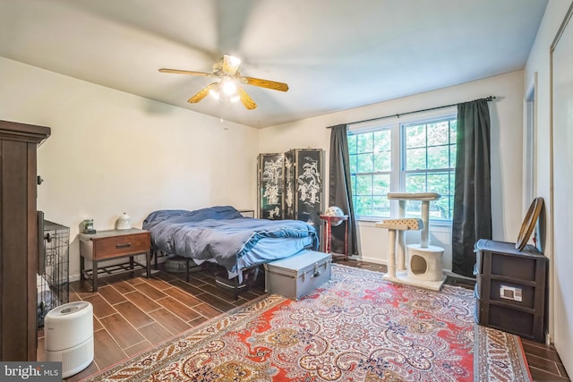 9185 Winterset Dr, Manassas, VA 20110 - bedroom with baseboards, wood finished floors, and a ceiling fan
