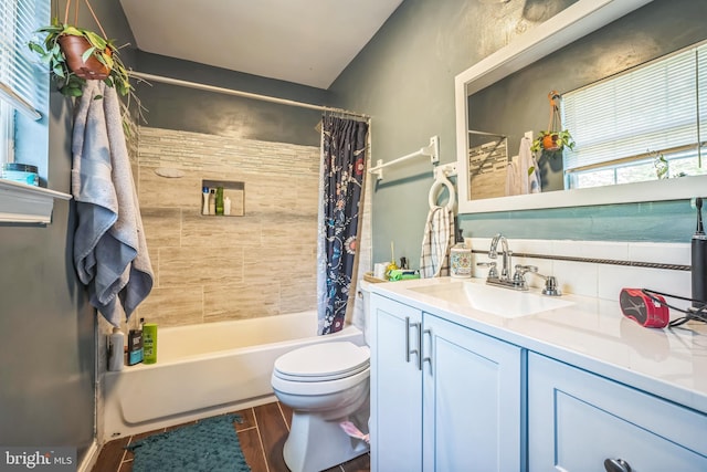 9185 Winterset Dr, Manassas, VA 20110 - bathroom featuring toilet, shower / bathtub combination with curtain, vanity, and wood finished floors