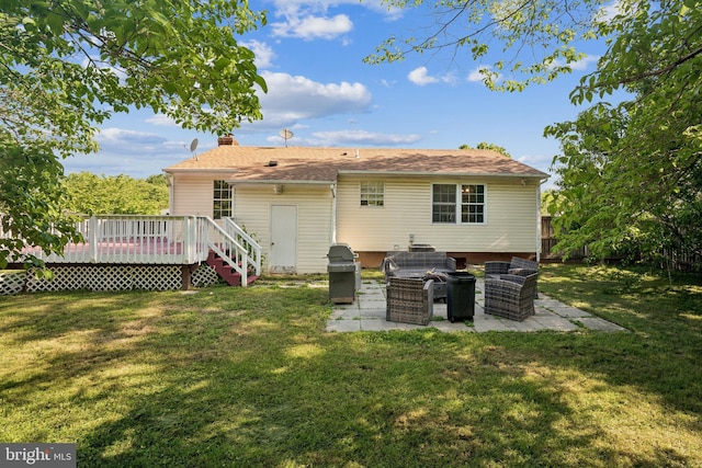 9185 Winterset Dr, Manassas, VA 20110 - back of house featuring a deck, a patio area, and a chimney