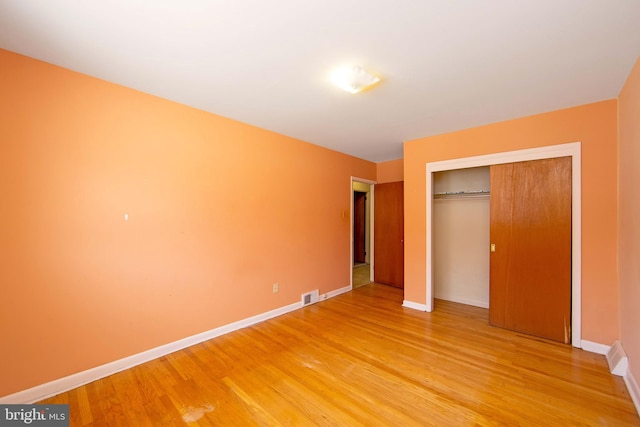 4021 Balwynne Park Rd, Philadelphia, PA 19131 - unfurnished bedroom featuring light wood finished floors, a closet, and baseboards
