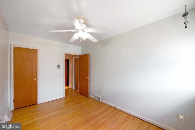 4021 Balwynne Park Rd, Philadelphia, PA 19131 - unfurnished bedroom featuring light wood finished floors, baseboards, and a ceiling fan