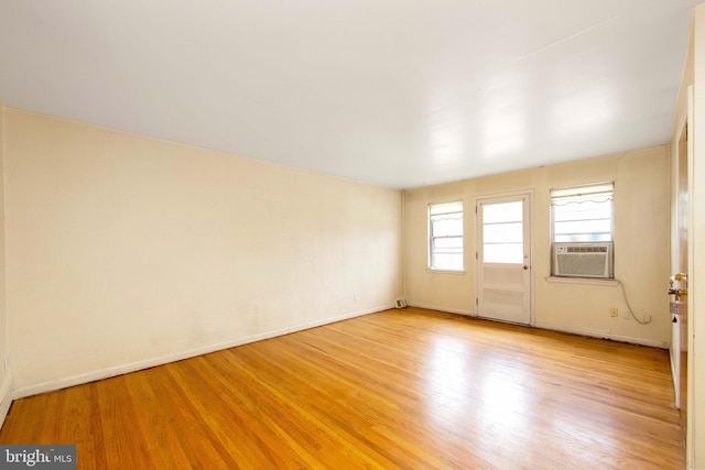 4021 Balwynne Park Rd, Philadelphia, PA 19131 - spare room with light wood-style flooring, cooling unit, and baseboards