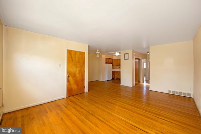 4021 Balwynne Park Rd, Philadelphia, PA 19131 - unfurnished living room featuring light wood finished floors, baseboards, and ceiling fan