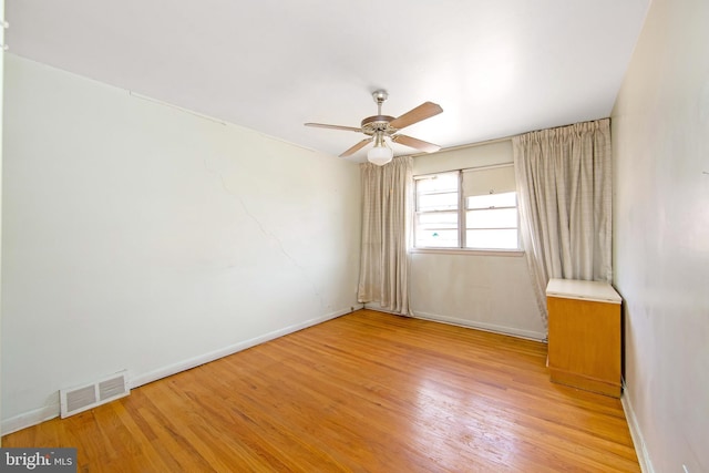 4021 Balwynne Park Rd, Philadelphia, PA 19131 - empty room with a ceiling fan, light wood finished floors, and baseboards