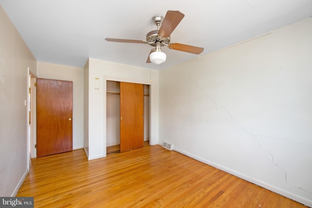 4021 Balwynne Park Rd, Philadelphia, PA 19131 - unfurnished bedroom featuring baseboards, light wood finished floors, a closet, and ceiling fan