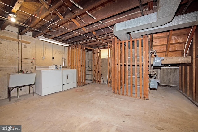 4021 Balwynne Park Rd, Philadelphia, PA 19131 - unfinished below grade area featuring washer and dryer, gas meter, and a sink