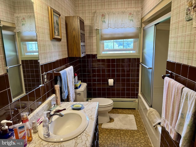 1954 High Park Mnr, Pottsville, PA 17901 - full bath with wallpapered walls, baseboard heating, tile walls, healthy amount of natural light, and wainscoting