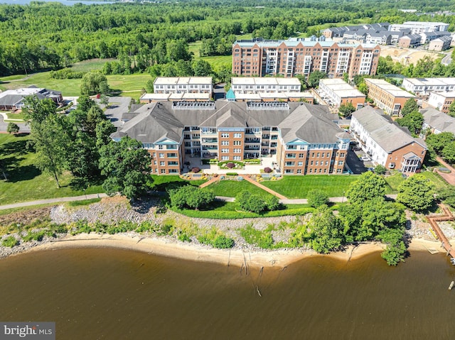 440 Belmont Bay Dr Unit 406, Woodbridge, VA 22191 - drone / aerial view of a large body of water, a forest, and apartment complex