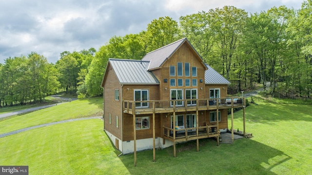 311 Summit Woods Dr, Mc Henry, MD 21541 - rear view of house featuring a wooden deck, a yard, and metal roof