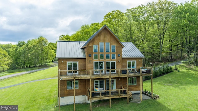 311 Summit Woods Dr, Mc Henry, MD 21541 - back of house with a yard, a deck, a standing seam roof, and metal roof