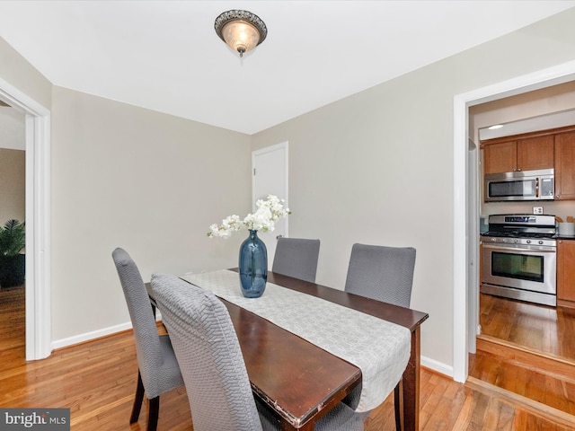 2820 Harris Ave, Silver Spring, MD 20902 - dining area featuring light wood-style flooring and baseboards