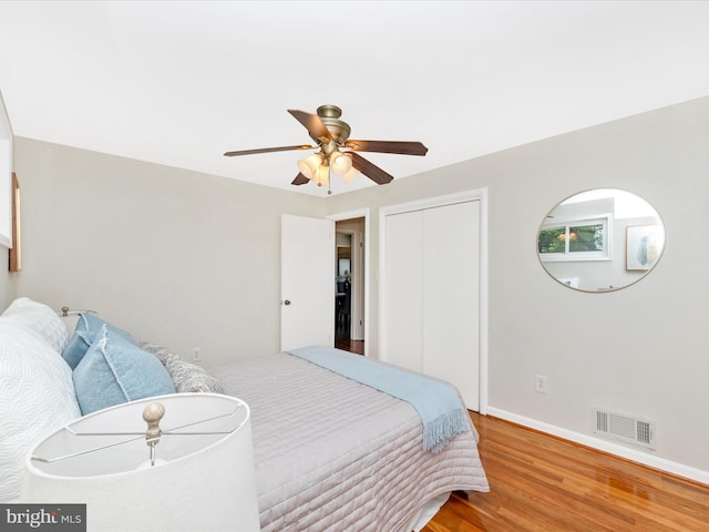 2820 Harris Ave, Silver Spring, MD 20902 - bedroom featuring wood finished floors, a closet, ceiling fan, and baseboards