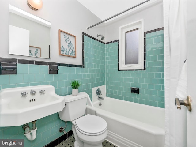 2820 Harris Ave, Silver Spring, MD 20902 - full bathroom featuring tile walls, toilet, shower / bath combo, tile patterned floors, and a sink