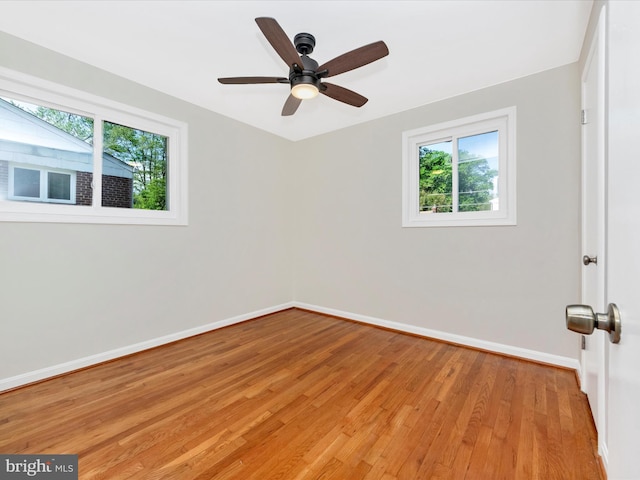 2820 Harris Ave, Silver Spring, MD 20902 - empty room featuring light wood-style floors, baseboards, and a ceiling fan