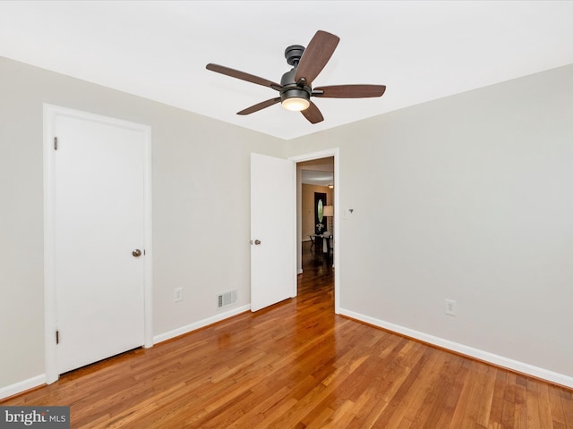 2820 Harris Ave, Silver Spring, MD 20902 - unfurnished room with light wood-style floors, a ceiling fan, and baseboards