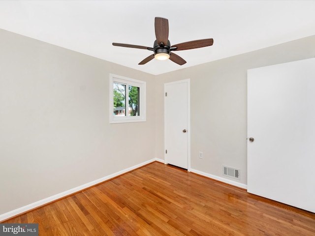 2820 Harris Ave, Silver Spring, MD 20902 - unfurnished bedroom featuring light wood-type flooring, baseboards, and a ceiling fan