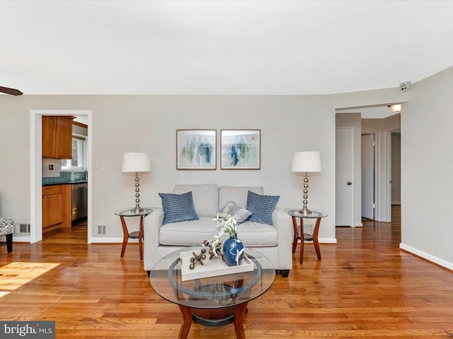 2820 Harris Ave, Silver Spring, MD 20902 - living room featuring light wood-style flooring and baseboards