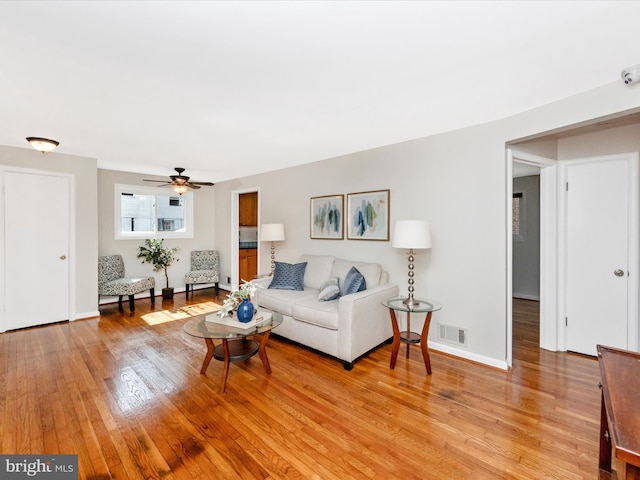 2820 Harris Ave, Silver Spring, MD 20902 - living room with light wood-style floors, ceiling fan, and baseboards
