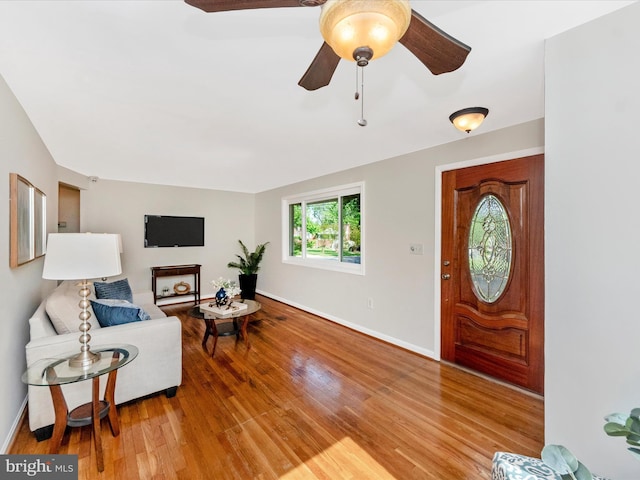 2820 Harris Ave, Silver Spring, MD 20902 - entrance foyer with light wood-style flooring, ceiling fan, and baseboards