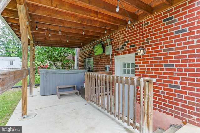 view of patio featuring a hot tub