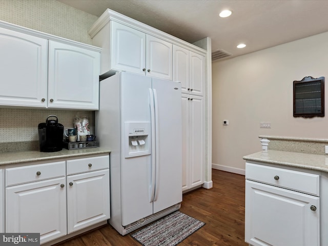 12953 Little Hayden Cir, Hagerstown, MD 21742 - kitchen with white refrigerator with ice dispenser, dark wood finished floors, white cabinets, and recessed lighting