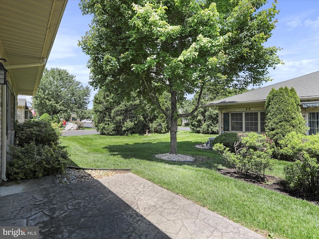 12953 Little Hayden Cir, Hagerstown, MD 21742 - view of grassy yard featuring a patio