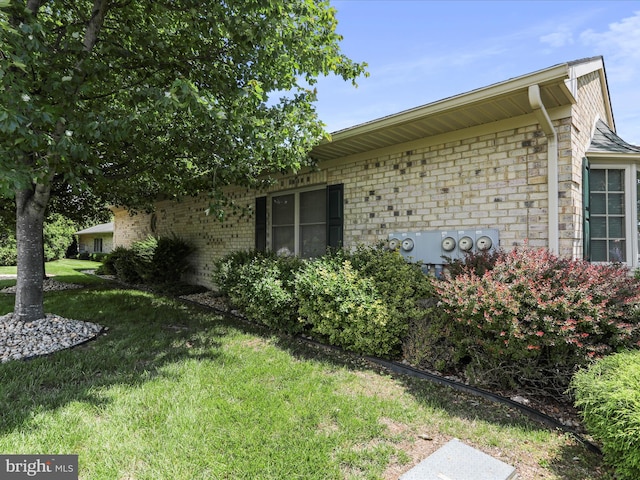12953 Little Hayden Cir, Hagerstown, MD 21742 - view of home's exterior with brick siding and a yard