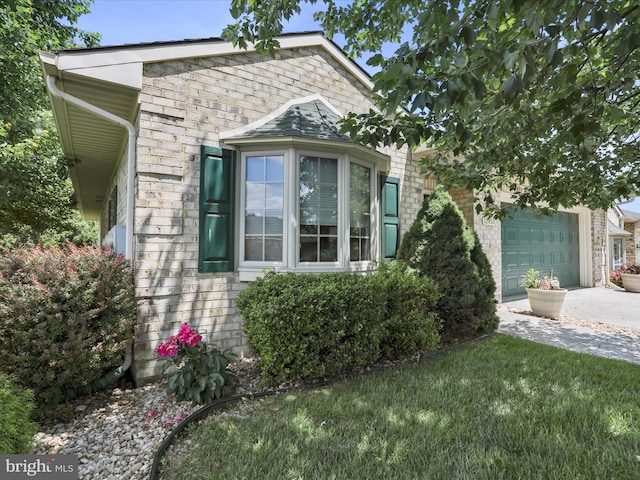 12953 Little Hayden Cir, Hagerstown, MD 21742 - view of front facade with a garage, stone siding, and concrete driveway