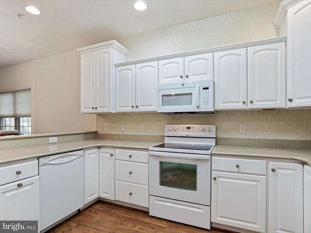 12953 Little Hayden Cir, Hagerstown, MD 21742 - kitchen with white appliances, white cabinets, dark wood-type flooring, light countertops, and tasteful backsplash