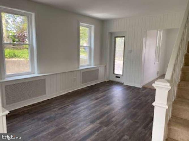 70 Chestnut St, Mohnton, PA 19540 - entrance foyer featuring dark wood finished floors, radiator heating unit, and stairway