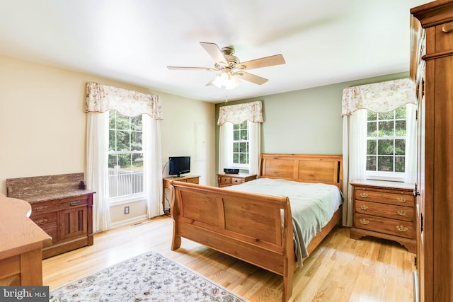 14323 Shiloh Church Rd, Laurel, DE 19956 - bedroom featuring light wood-type flooring and ceiling fan