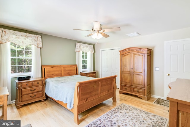 14323 Shiloh Church Rd, Laurel, DE 19956 - bedroom with light wood finished floors, a closet, a ceiling fan, and baseboards
