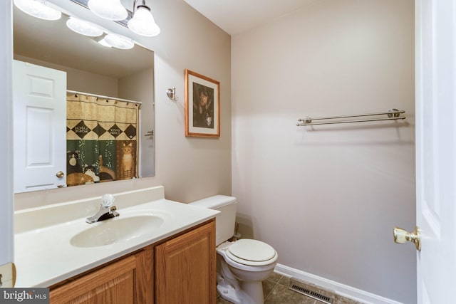 14323 Shiloh Church Rd, Laurel, DE 19956 - bathroom with toilet, tile patterned flooring, and vanity