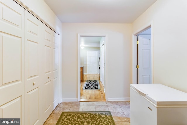 14323 Shiloh Church Rd, Laurel, DE 19956 - corridor with baseboards and light tile patterned floors