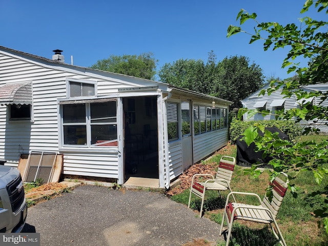 196 Jerrys Ave, Clayton, NJ 08312 - view of side of home with a sunroom