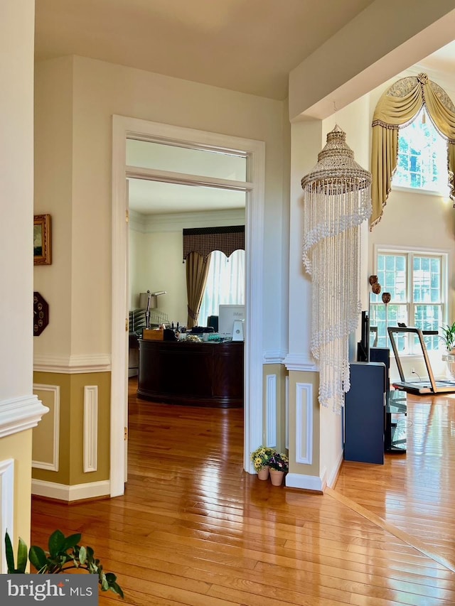 4718 Village Dr, Fairfax, VA 22030 - corridor featuring a chandelier, hardwood / wood-style floors, and baseboards