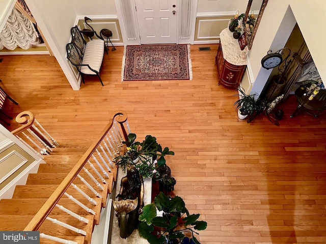 4718 Village Dr, Fairfax, VA 22030 - foyer entrance featuring hardwood / wood-style flooring and stairway